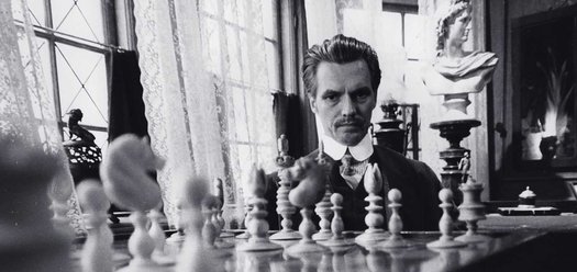 Per Oscarsson as the titluar character of Doctor Glas (1968), staring at a chess board