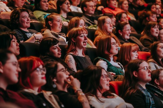 An image of enthusiastic cinema goers