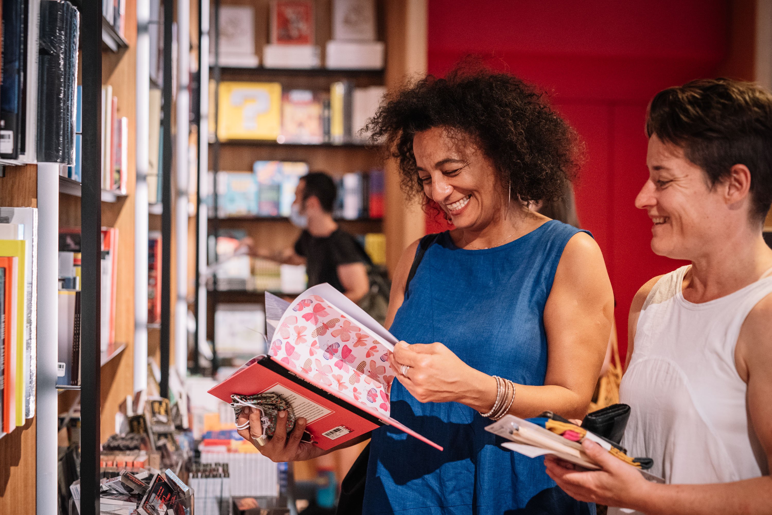 Happy ACMI Members browse books in the ACMI Shop