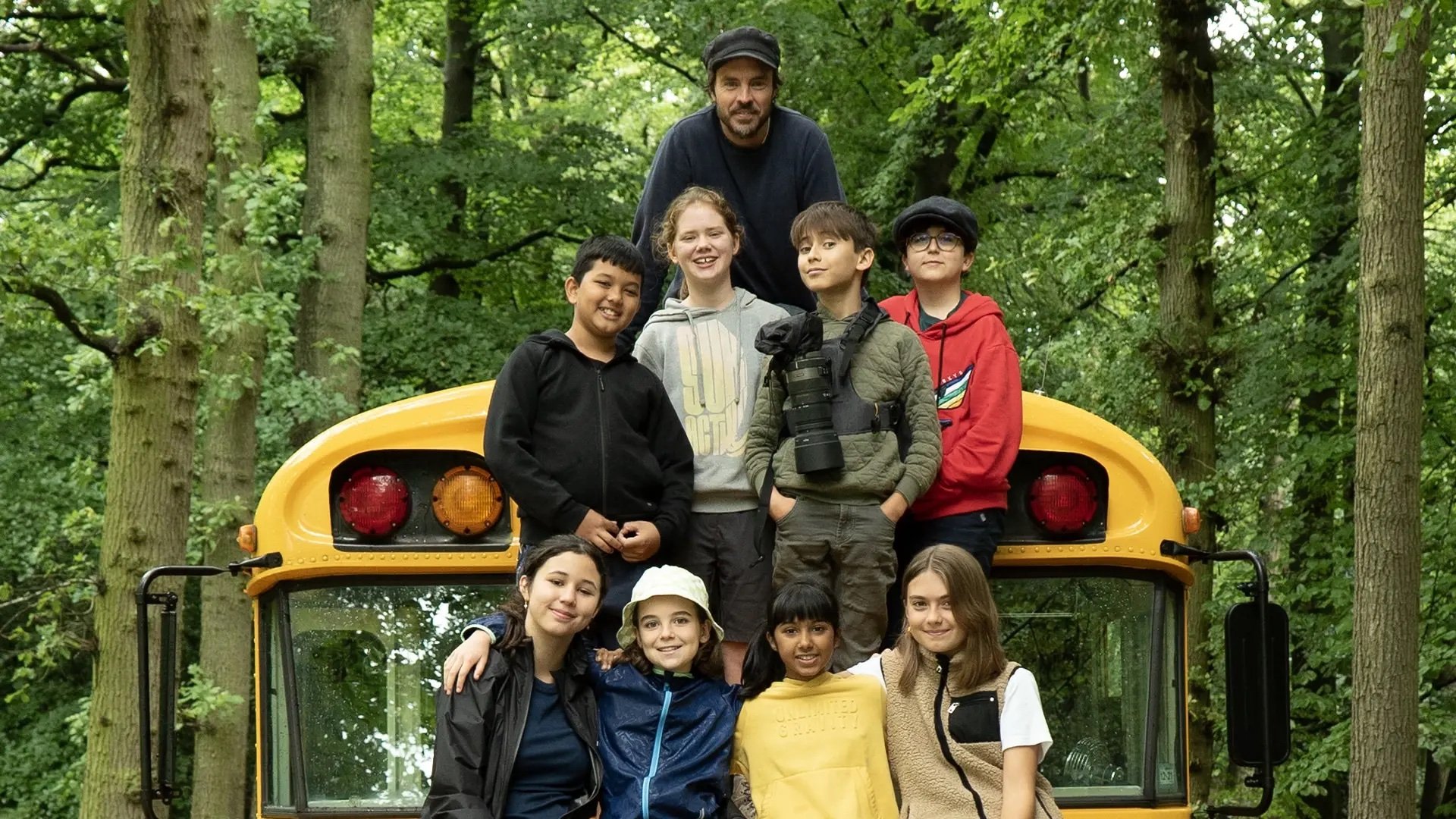 Young members of the Future Council and documentarian Damon Gameau photographed in a pyramid in front of the Future Council bus