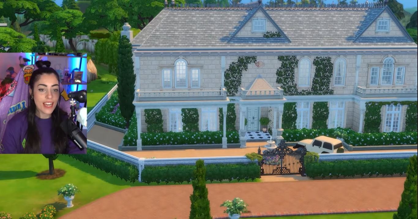 The streamer JeyJey Bink showing off her recreation of the gilmore girl's esteemed stately home in the sims 4.