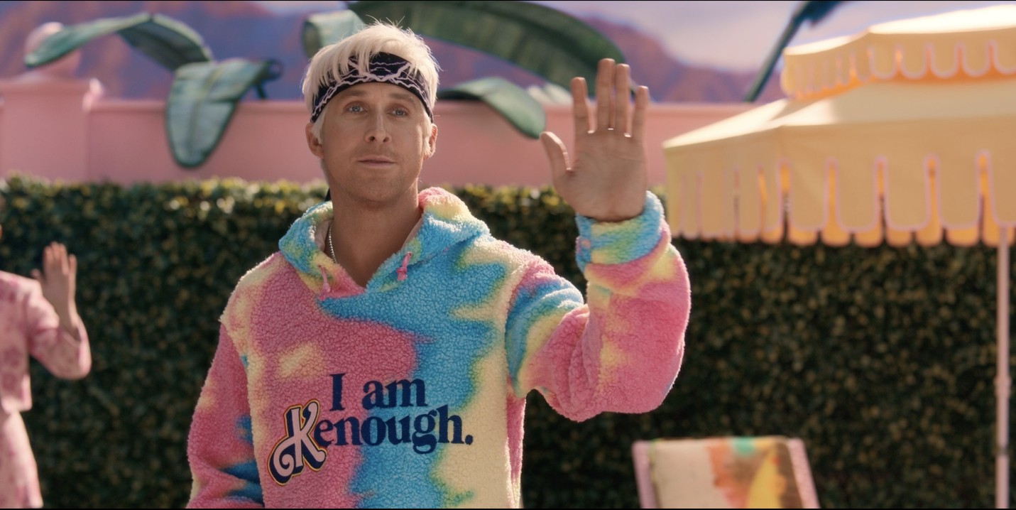 Ken from Barbie is wearing his Ken is enough jumper