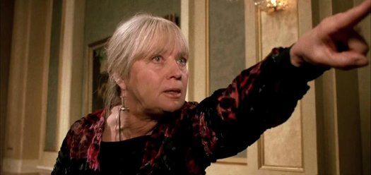 Mai Zetterling as Grandma Helga pointing in a still from ' The Witches' (1990)