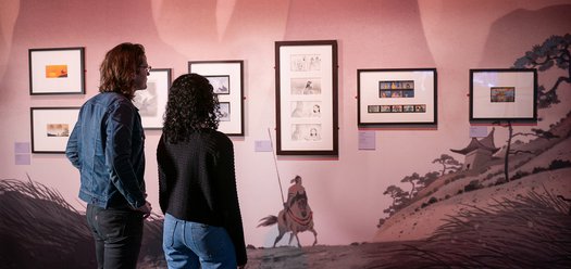 What visitors are saying about Disney - The Magic of Animation - two people looking at artwork from Mulan