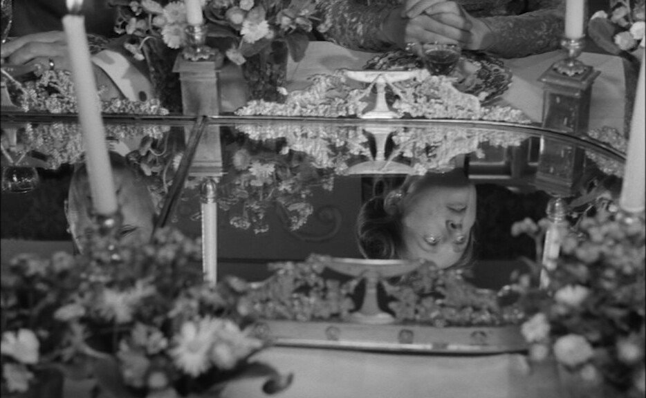 Reflections on a dinner tray in a still from 'Loving Couples' (1964)