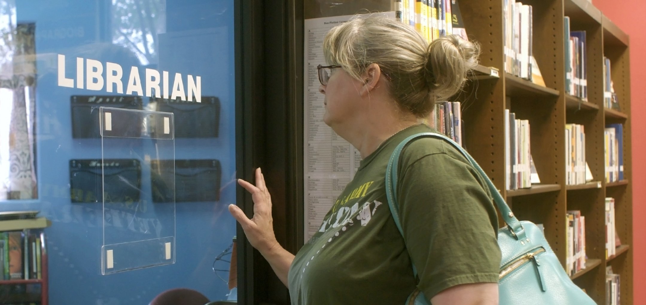 web - TheLibrarians-KASnyder-2560x1440-STILL01-office-c_AmyBench