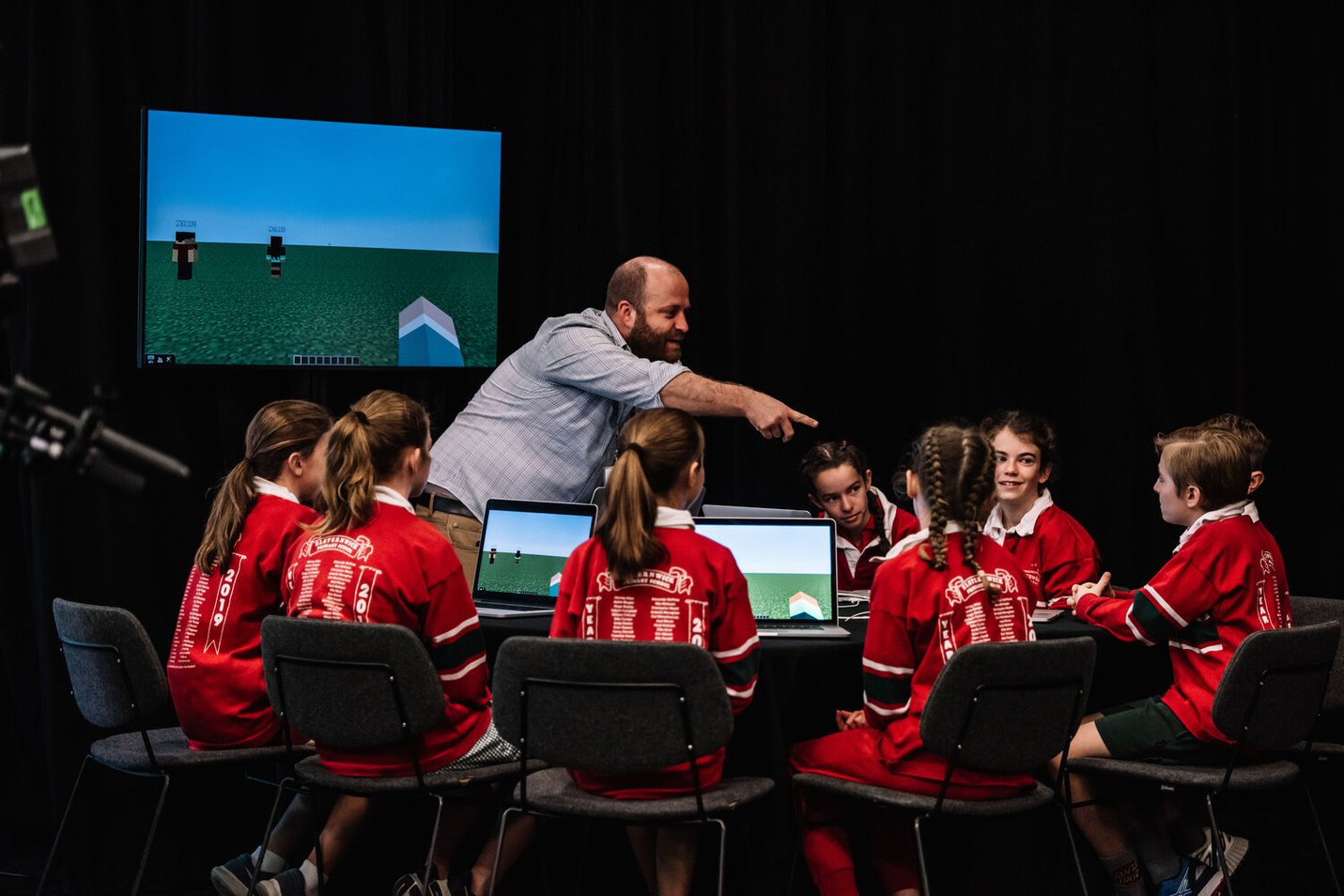 The year six class from Elsternwick Primary School interact with an activity station in the Gandel Digital Future Lab