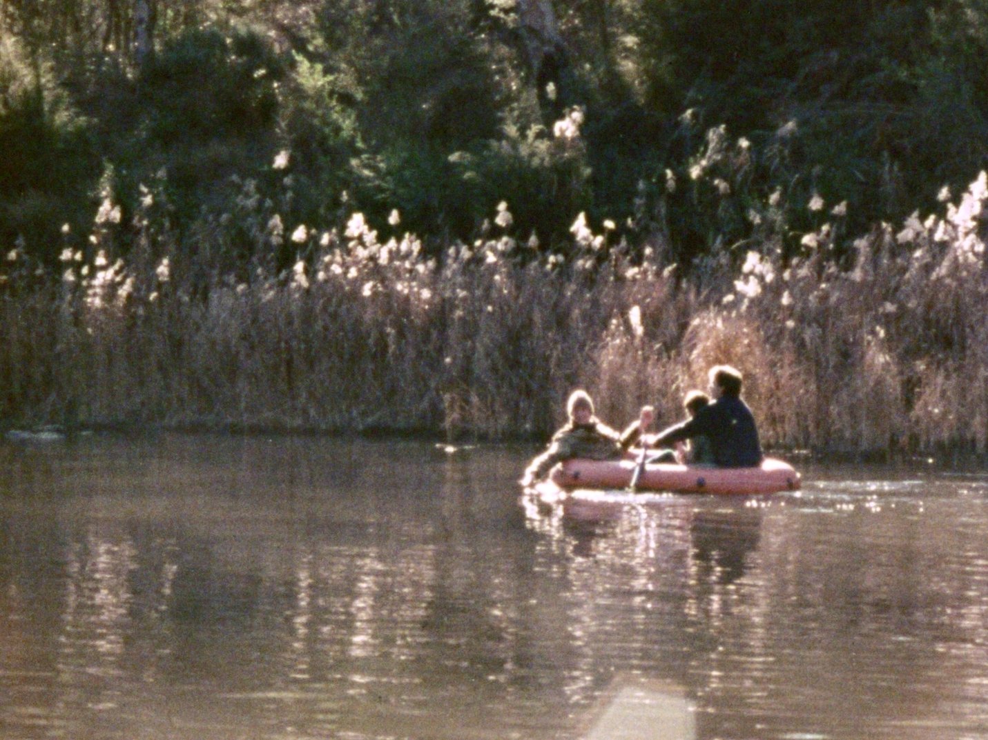 A rubber dinghy on a suburban lake - still from Time changes, 1978