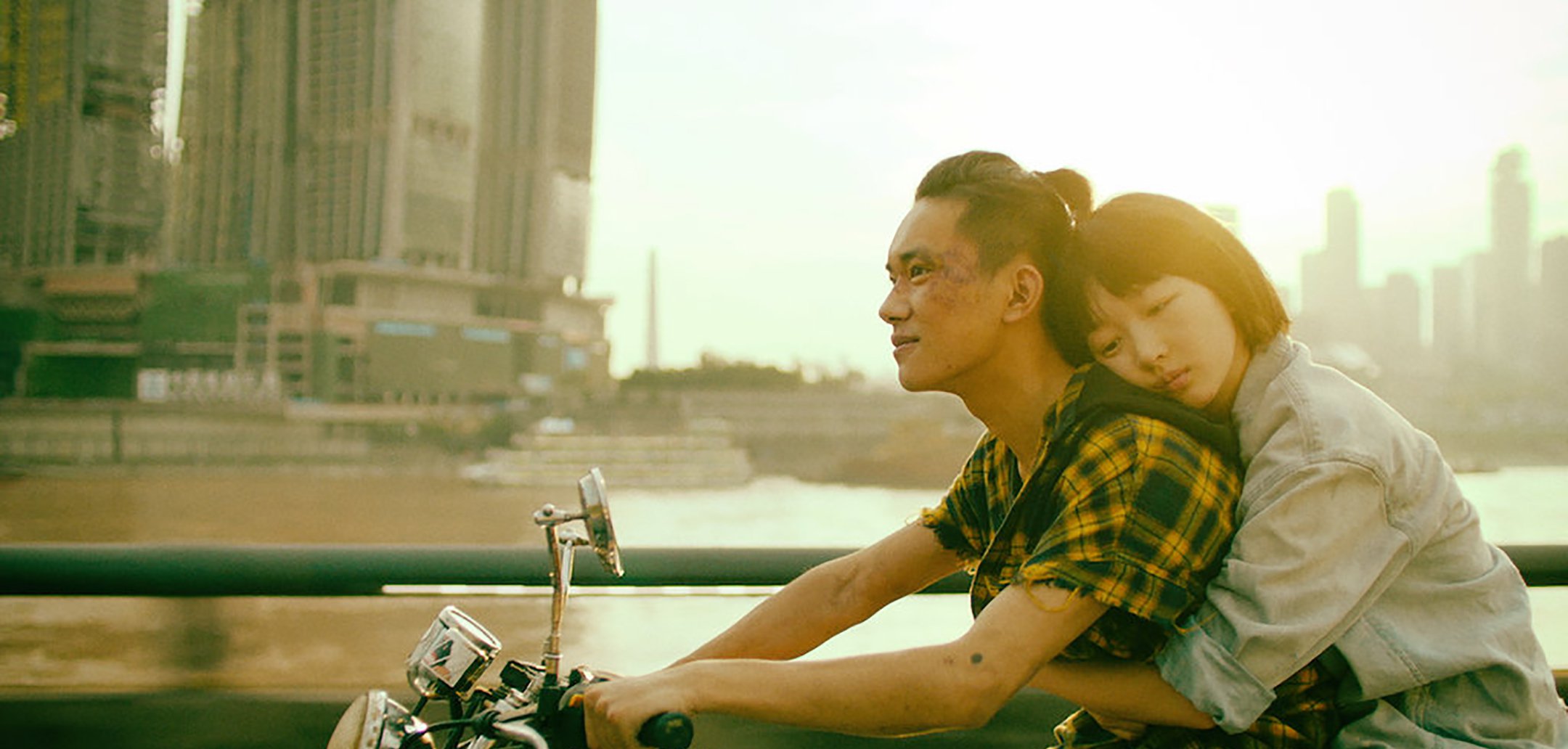 Jackson Ye and Zhou Dongyu on a motorbike in a still from 'Better Days' (2019) Courtesy of Magnum Pictures
