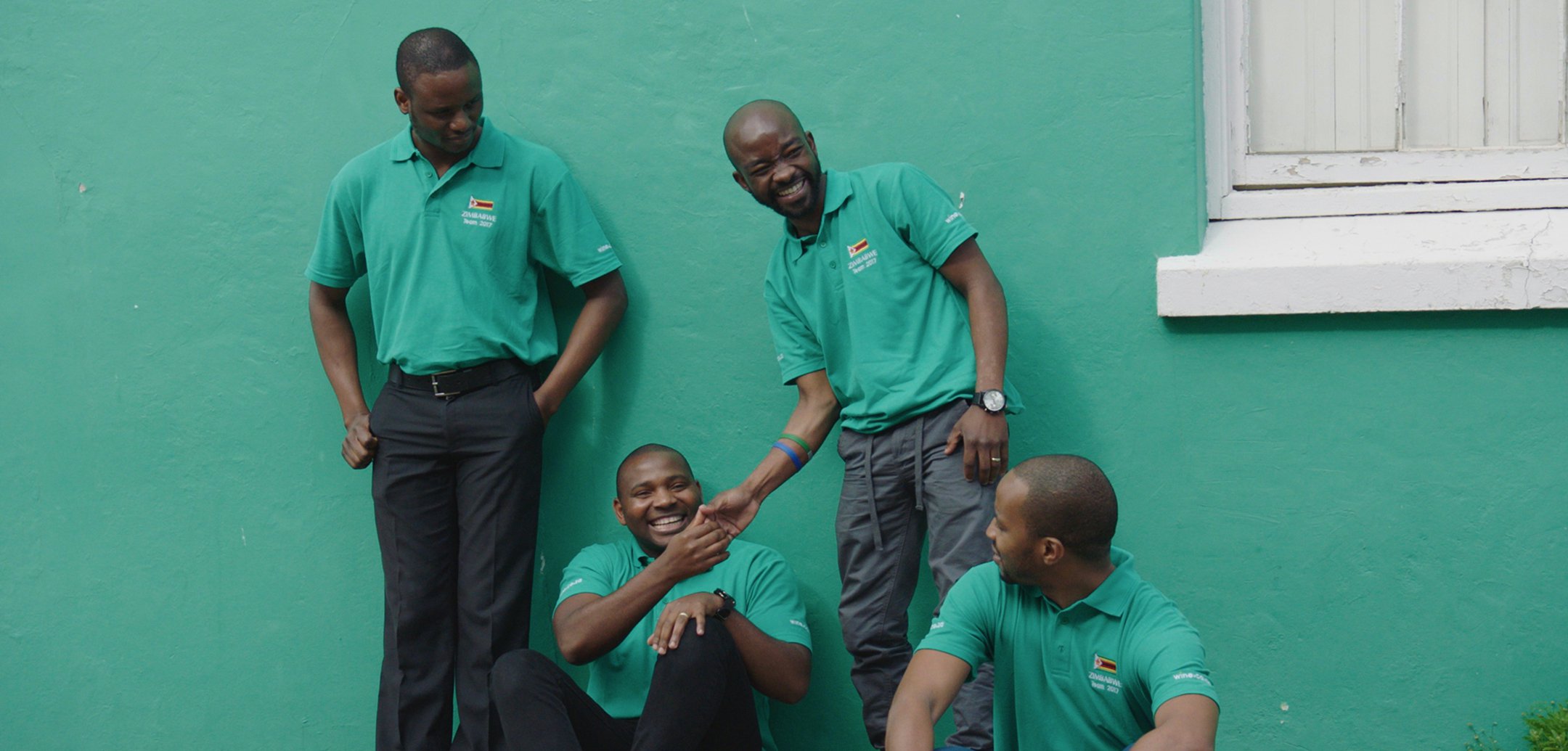 Sommeliers Joseph, Tinashe, Marlvin and Pardon in a still from 'Blind Ambition' (2021)