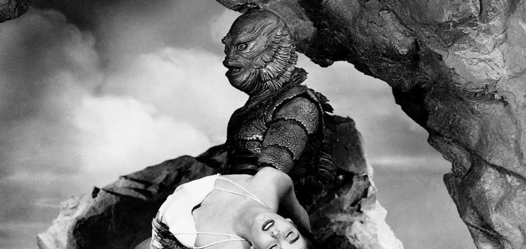 The Gill Man carries Kay in a still from 'Creature from the Black Lagoon' (1954)