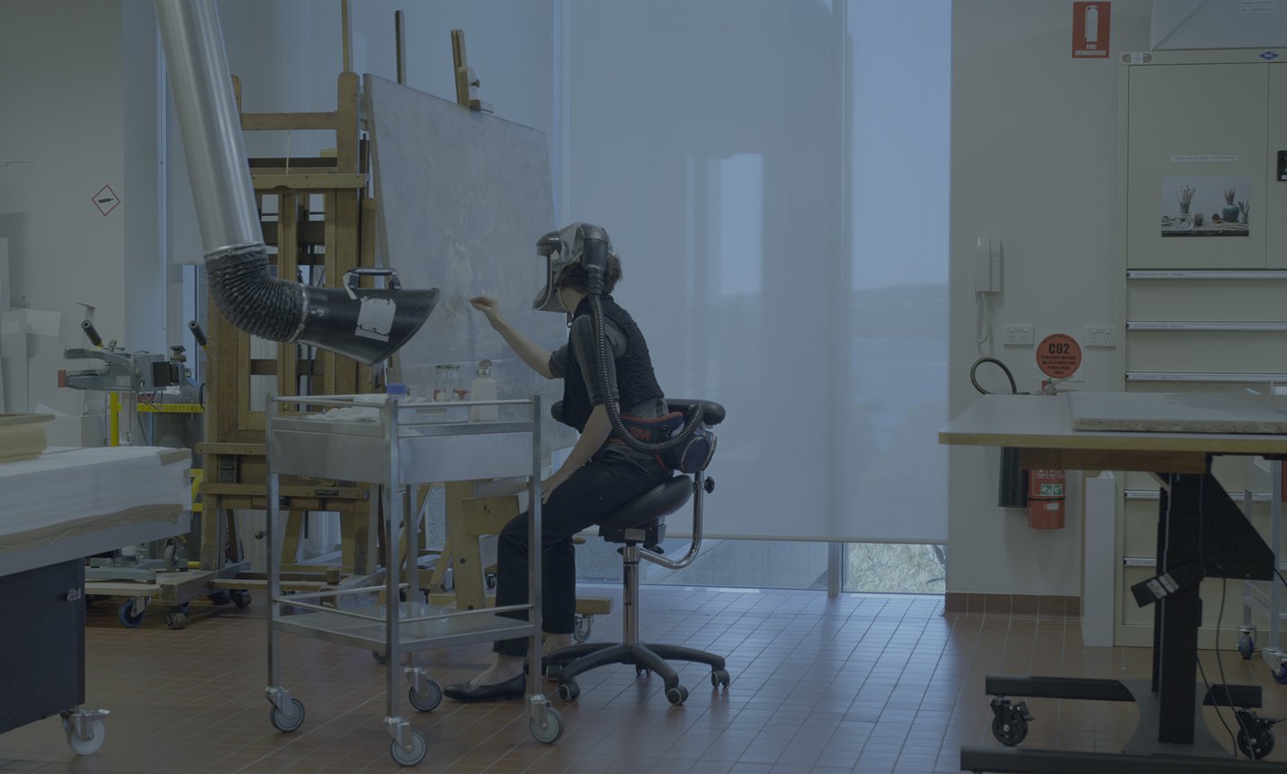 Andrea Nottage, painting conservator, working on ‘Flood of the Darling, 1890’ by W.C. Piguenit - Darling Darling