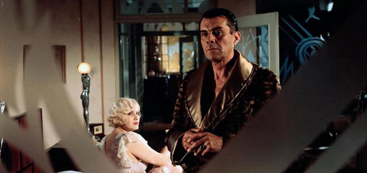 Dirk Bogarde and Andréa Ferréol in a still from Despair (1978)