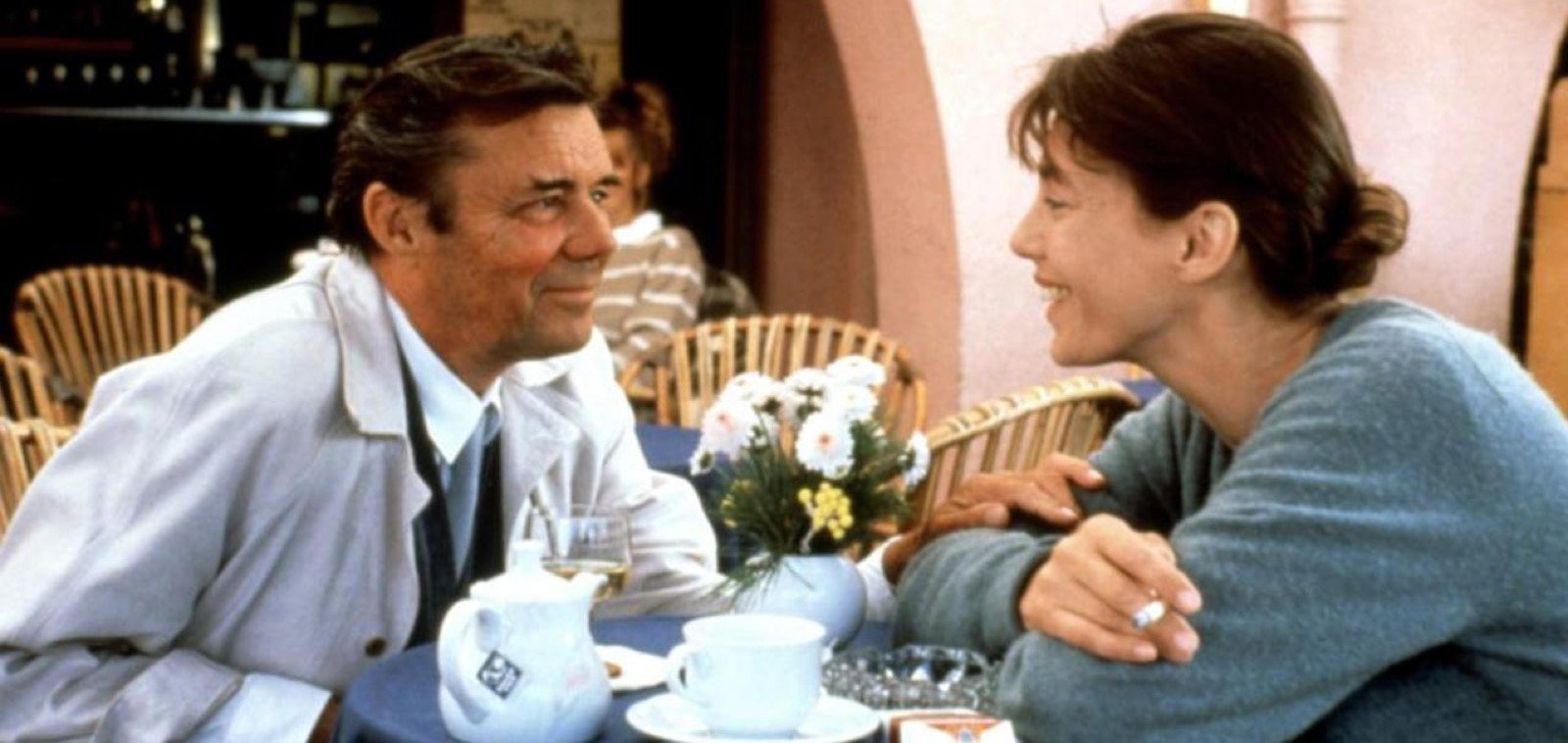 Dirk Bogarde and Jane Birkin having tea in scene from Daddy Nostalgie (1990)