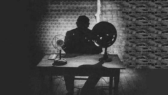Dr Mabuse in his cell writing letters.jpg