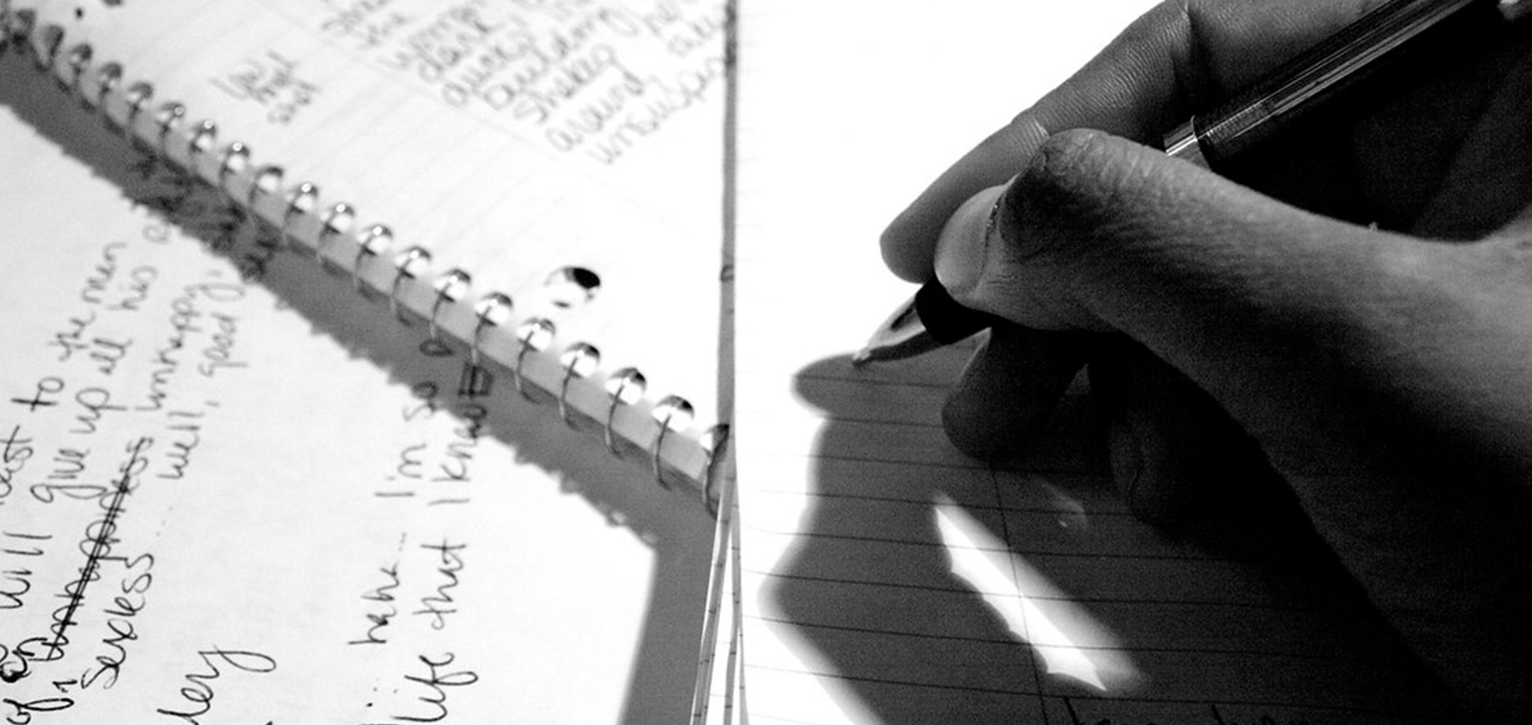 Closeup of hand writing on paper