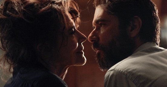 Fany Ardant and Melvil Poupaud lean in for a kiss - The Young Lovers (2021)