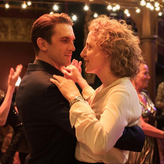 Dan Stevens and Maren Eggert slow dancing in a still from 'I'm Your Man' (2021)
