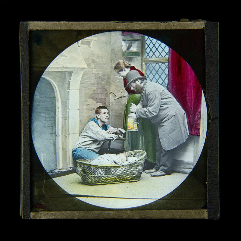Man with lantern, woman standing by baby’s bassinet and seated man - Jane Conquest - Creator, York & Son, England