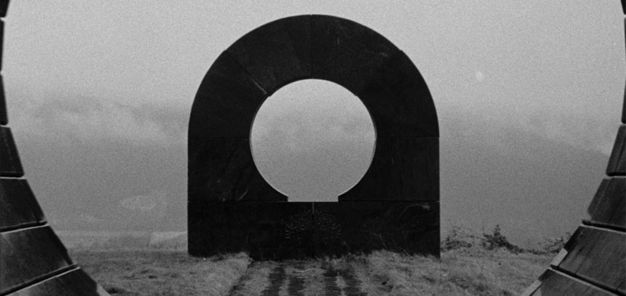 Circular arch monument in a still from 'Last and First Men' (2020)