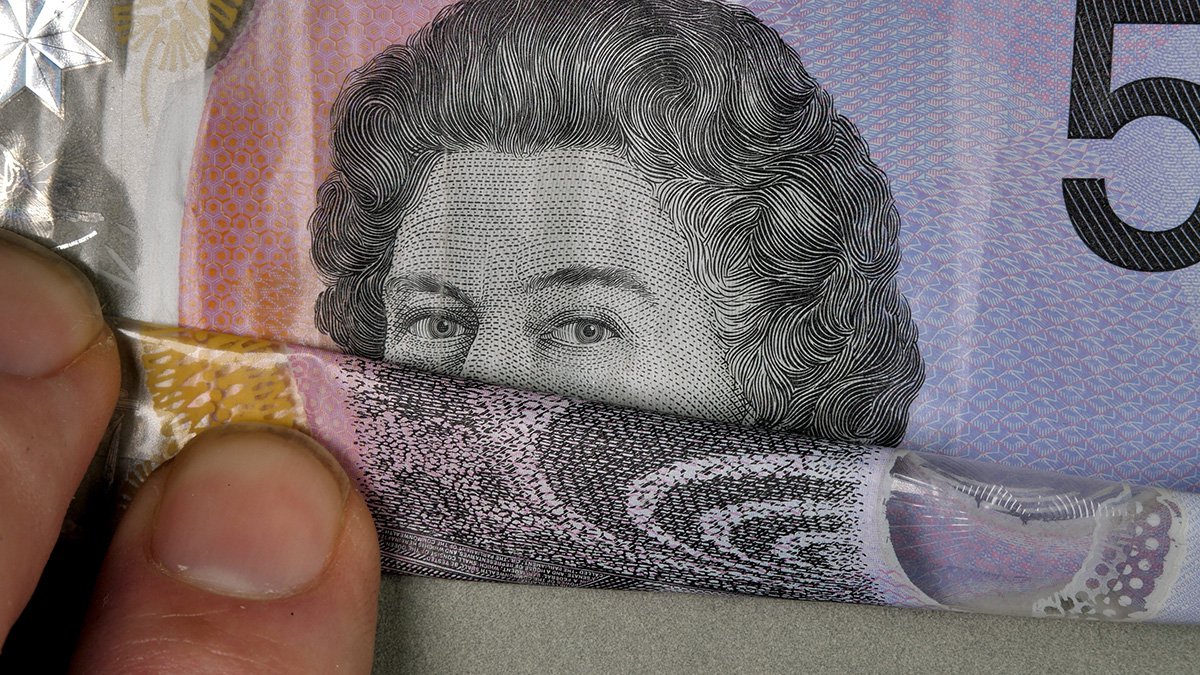 Matthew Griffin - content - 5 dollar note being folded
