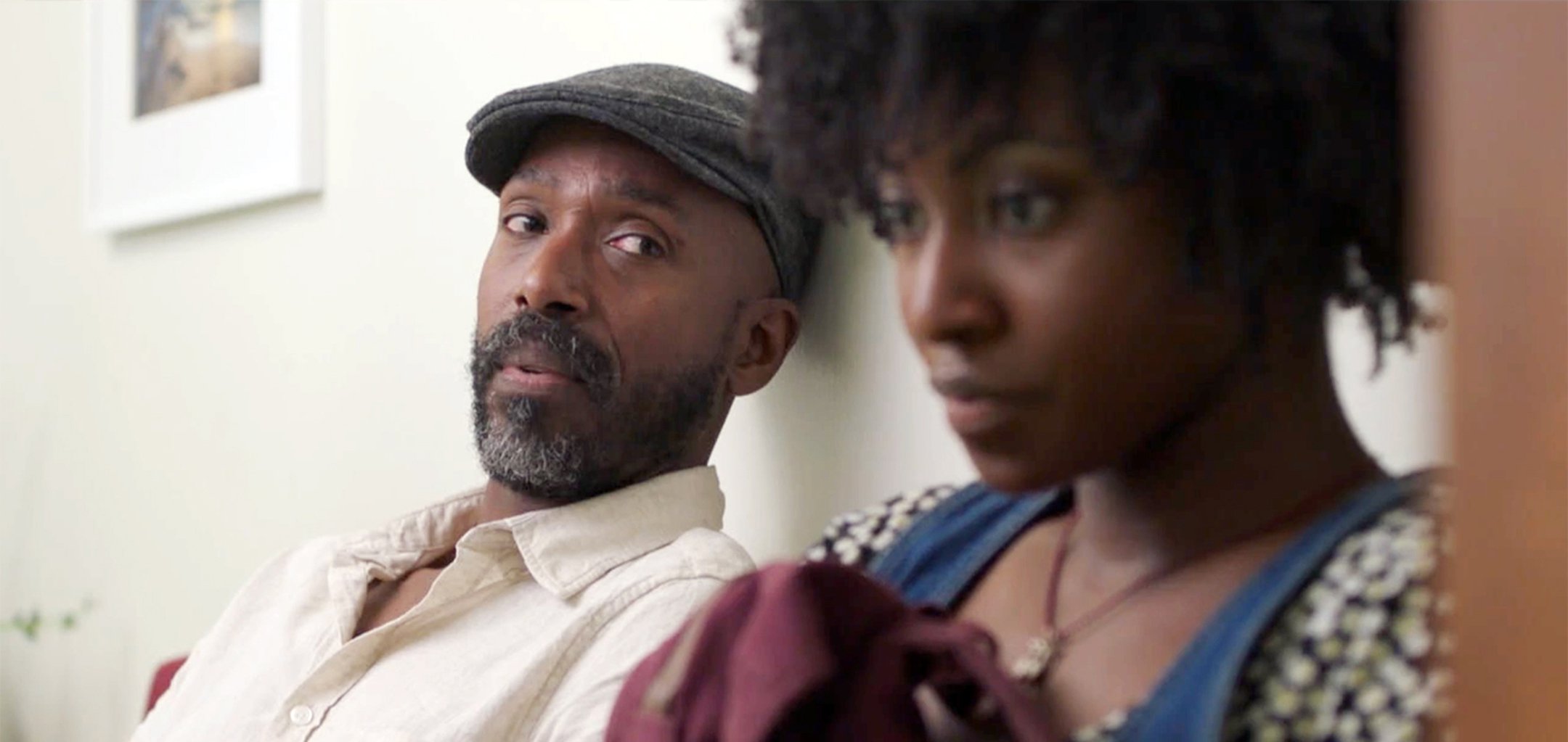 Ntare Mwine looks at Jayme Lawson in a still from Farewell Amor (2020)