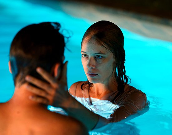 Paula Beer and Franz Rogowski in a pool, in a still from 'Undine' (2020) photo by Christian Schulz