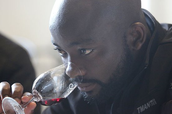 Sommelier smelling wine - still from 'Blind Ambition' (2021)