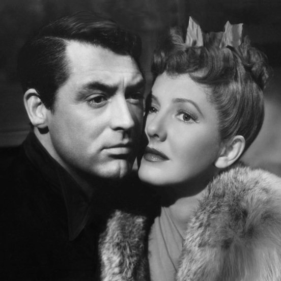 Cary Grant and Jean Arthur cheek-to-cheek in 'The Talk of the Town' (1942)