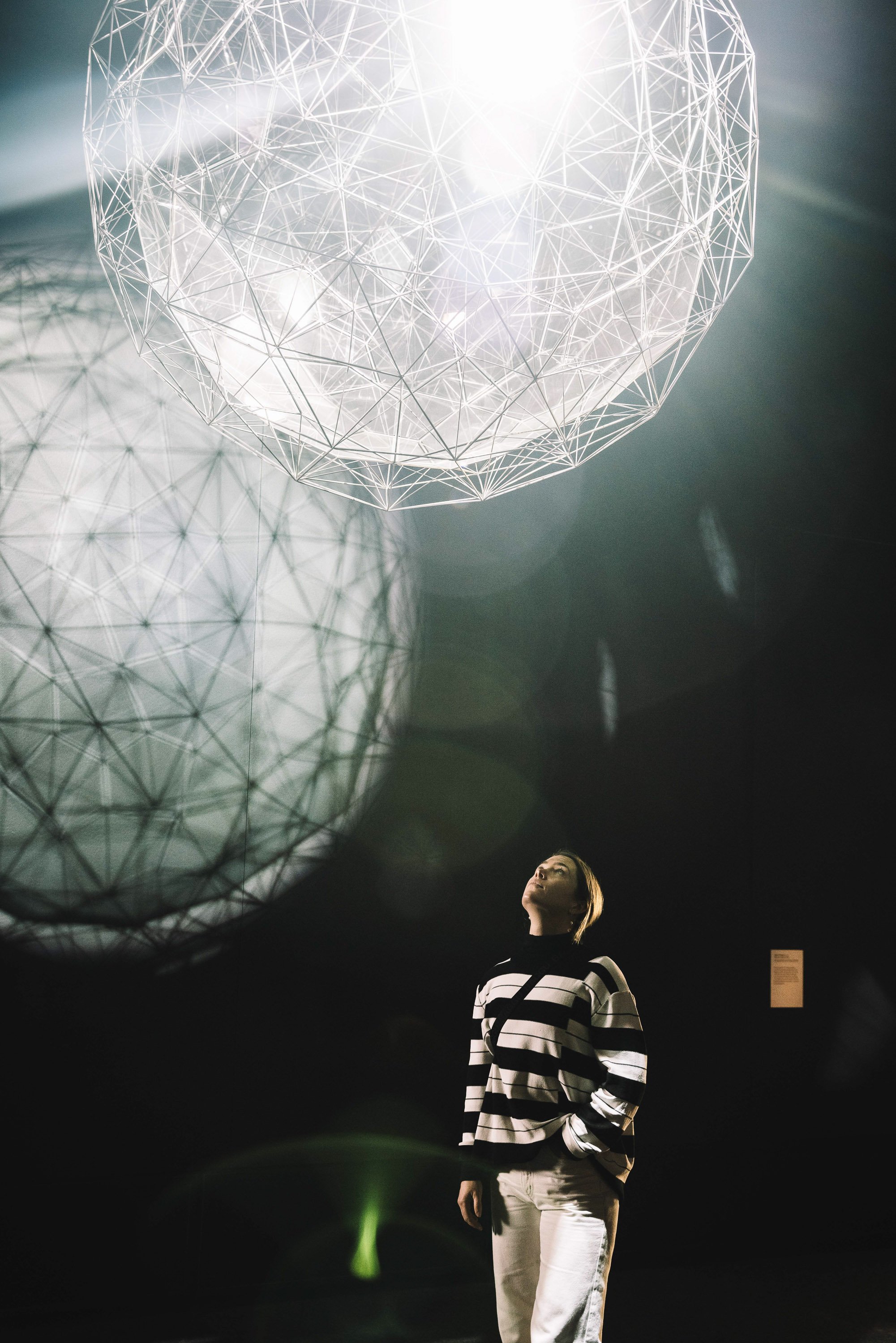 Woman looking up at Stardust Particle, Olafur Eliasson - Phoebe Powell