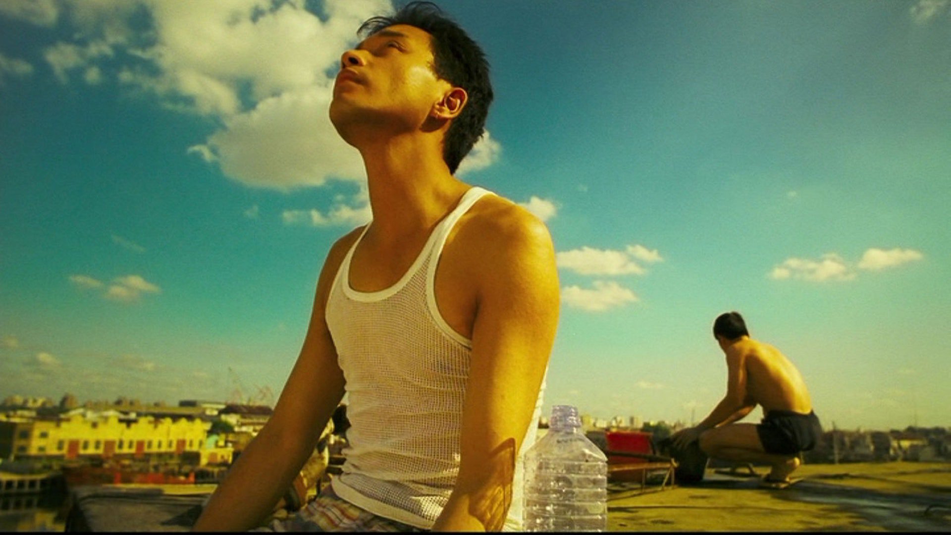 Leslie Cheung and Tony Leung Chiu-wai in Happy Together - on the rooftop