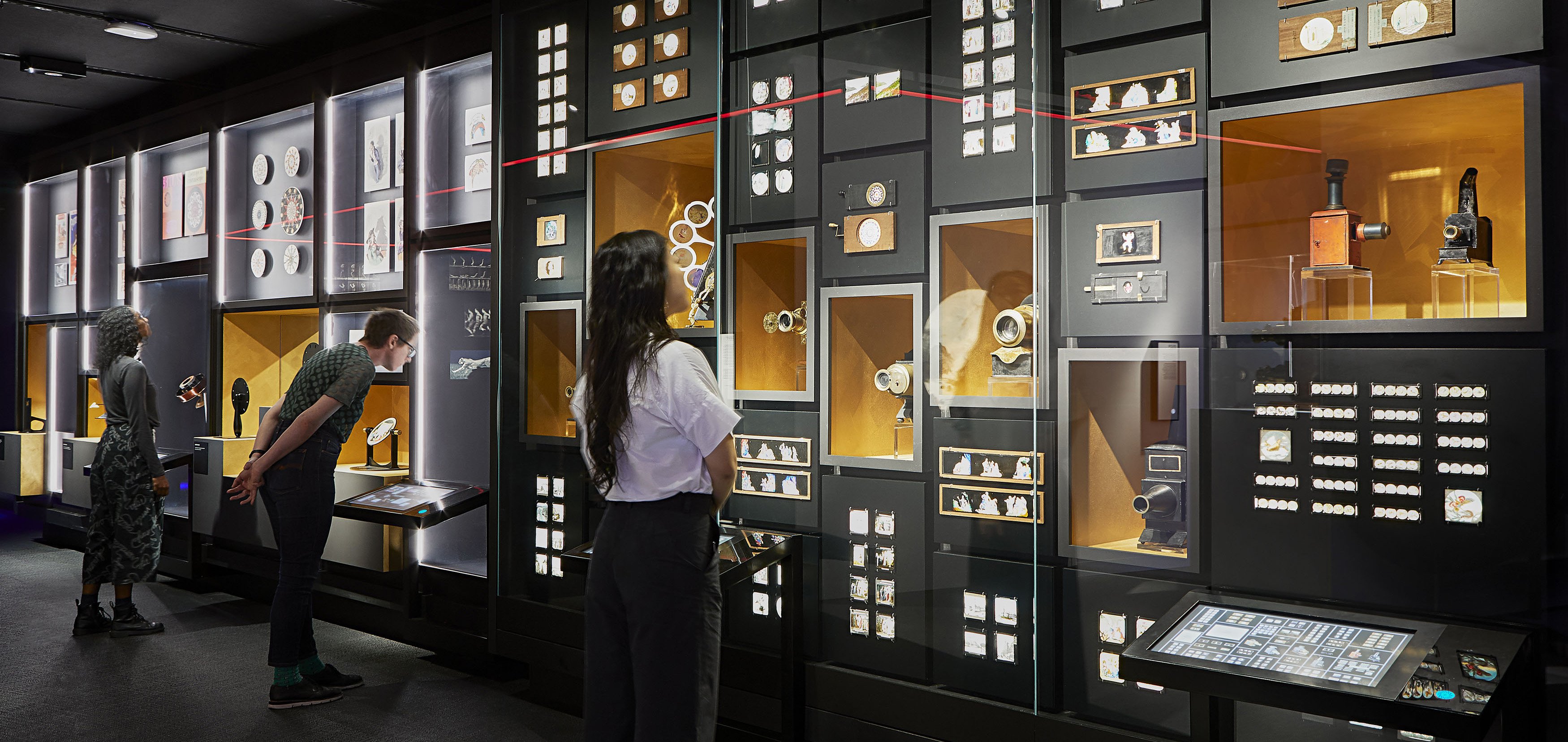 Wall of vintage cameras and slides in the Moving Pictures section of The Story of the Moving Image (image credit: Shannon McGrath)