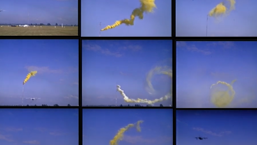 Still from Airborne_Thessalonians - planes and smoke spirals