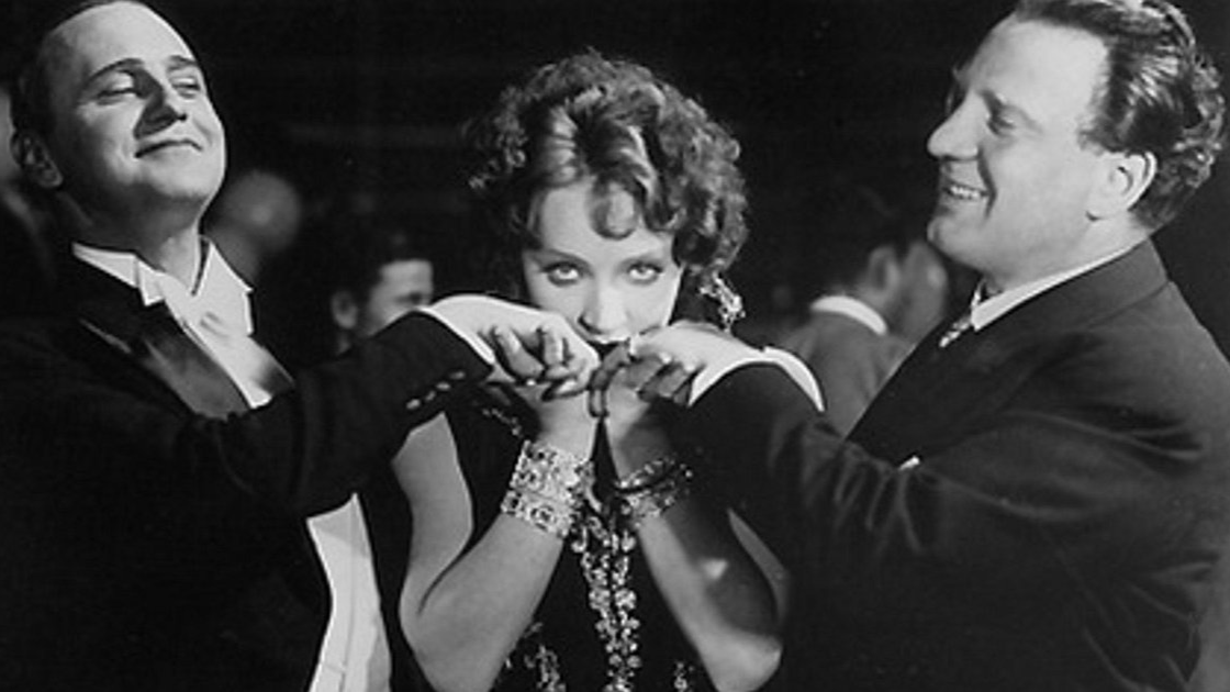 Pierre de Guingand, Marlene Dietrich, and Charles Puffy in I Kiss Your Hand, Madame
